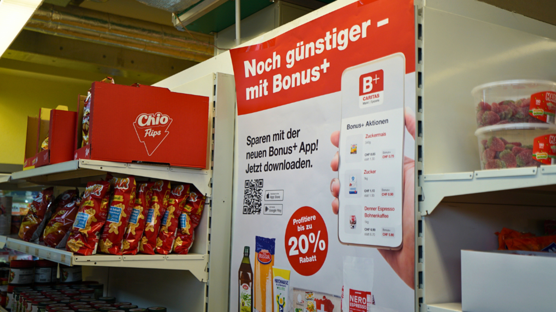 Publicité pour l'application Bonus+ à l'Épicerie Caritas de Baar