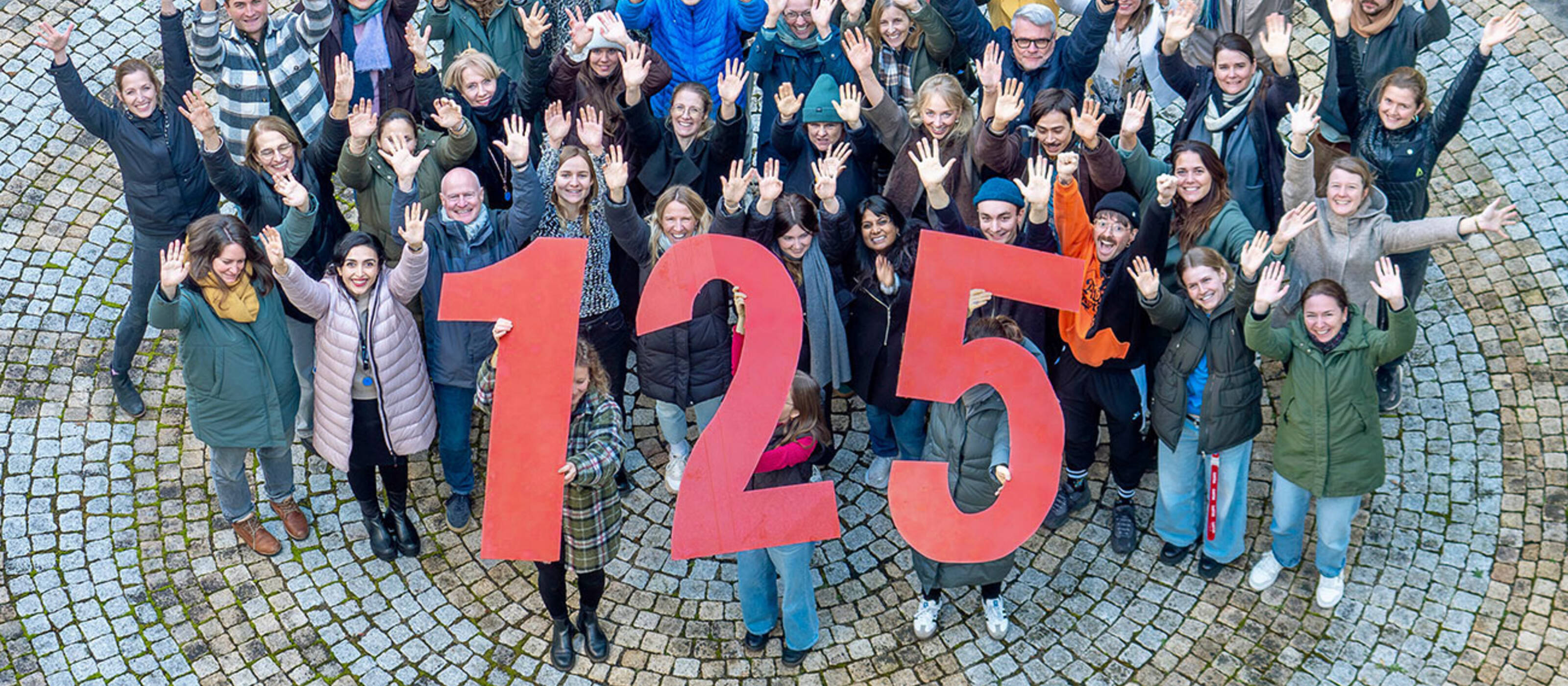 Les collaborateurs de Caritas se réjouissent à l'approche du 125e anniversaire. 